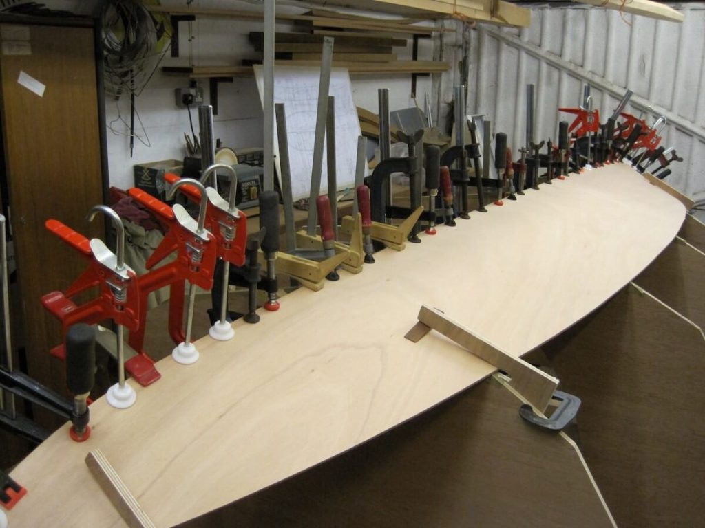 The first garboard going on