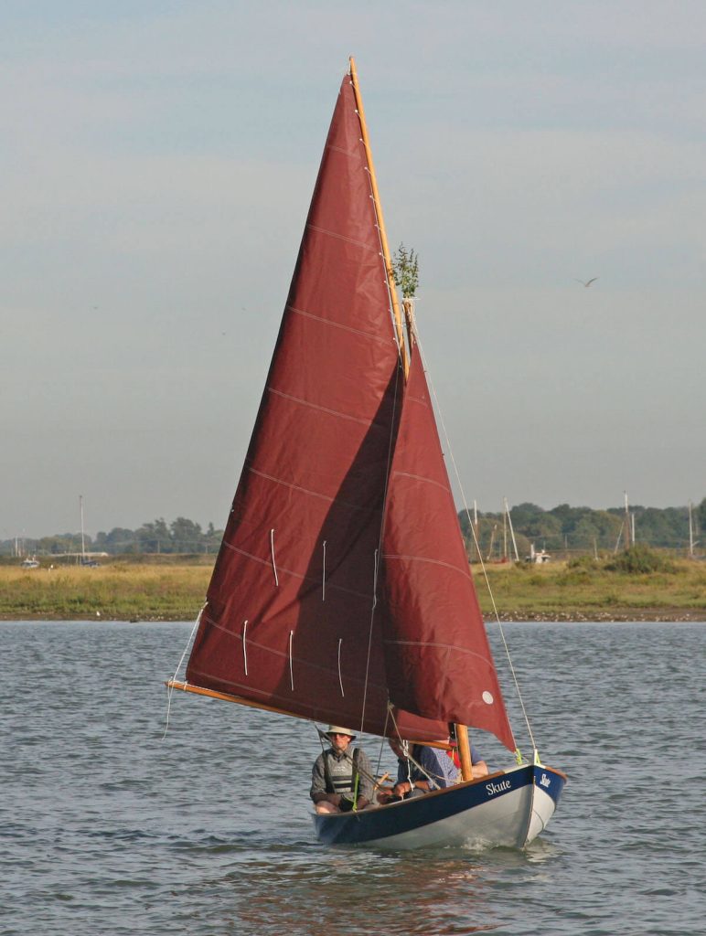 Launch day, with the traditional branch at the masthead.